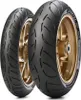 Two motorcycle tires are shown on gold rims against a white background. Náhled obrázku produktu