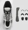 A shoe with quicklace system and its accessories laid out on a white and light gray background. Anteprima dell’immagine prodotto