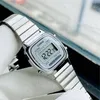 A close-up shot of a silver Casio digital watch on a white cloth. Podgląd zdjęcia produktu