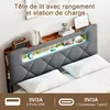 A modern gray upholstered headboard with built-in storage and LED lighting, featuring a wooden shelf and charging ports. Podgląd zdjęcia produktu