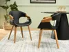 Two black dining chairs with wooden accents are shown in a dining room setting. Voir les images du produit