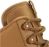 A close-up view of the top portion of a brown boot, focusing on the lacing system and collar. Produktbild-Vorschau