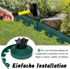 A hand is using a hammer to install green garden edging into the ground, with a coil of the edging and stakes in the foreground. Náhled obrázku produktu