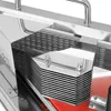 A close-up view of a stainless steel slicer, focusing on the cutting mechanism and a red conveyor belt. Anteprima dell’immagine prodotto