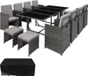 A rattan dining set with chairs, stools, and a table, along with a protective cover.