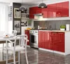 A modern kitchen with red high-gloss cabinets and stainless steel appliances. Náhľad obrázku produktu