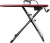 A Laurastar GO+ ironing board with an iron on it, shown from the side against a white background. Produktbild-Vorschau