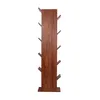 A tall, narrow bookshelf with a wood-grain finish and multiple small shelves protruding from a central column, set against a white background. Podgląd zdjęcia produktu