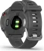 The back of a gray Garmin Forerunner 55 smartwatch with its heart rate sensor illuminated. Náhľad obrázku produktu