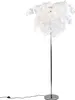 A white floor lamp with a metallic stand against a white background. Produktbild-Vorschau