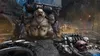 A first-person perspective of a video game character holding a weapon, facing a large monster in a dark, apocalyptic environment. Produktbild-Vorschau