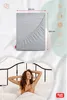 A fitted sheet is shown with dimensions, and a woman is relaxing in bed. Produktbild-Vorschau