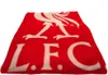 A folded red blanket with the Liverpool FC logo and text printed in white. Náhľad obrázku produktu
