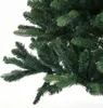A close-up view of the branches and needles of an artificial Christmas tree. Produktbild-Vorschau