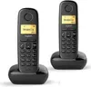Two black Gigaset cordless phones are shown on their charging bases against a white background. Produktbild-Vorschau
