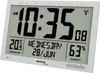 A digital clock displaying time, date, temperature, and humidity. Voir les images du produit