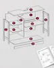 An exploded diagram showing the assembly of a desk or cabinet with various parts labeled with letters. Náhled obrázku produktu