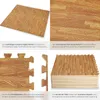 tectake® Schutzmattenset 12-teilig mit 24 Randstücken je 61 Produktbild-Vorschau 4