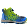 A side view of a single green and blue hiking boot for boys, presented on a white background. Produktbild-Vorschau