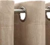 Close-up of beige curtains with grommets on a curtain rod. Produktbild-Vorschau
