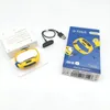The image shows a Fitbit Ace 3 special edition Minions themed activity tracker, its charging cable, and its packaging. Produktbild-Vorschau