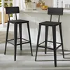 Two black bar stools with backrests are shown in a kitchen setting. Produktbild-Vorschau