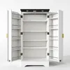 An open white cabinet with black accents and gold handles, displaying multiple shelves. Anteprima dell’immagine prodotto