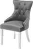 A studio shot of a single gray velvet dining chair with silver legs. Produktbild-Vorschau