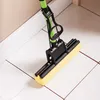 A sponge mop is shown on a tiled floor. Podgląd zdjęcia produktu