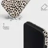 A phone case with a dalmatian print is shown in a dynamic presentation, suggesting durability and style. Podgląd zdjęcia produktu