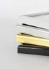 A stack of four picture frames in different colors (white, silver, gold, and black) on a white background. Podgląd zdjęcia produktu