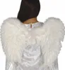 A person wearing white angel wings. Anteprima dell’immagine prodotto