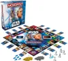 A Star Wars themed Monopoly board game and its box are displayed on a white background. Produktbild-Vorschau