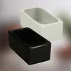 Two rectangular ceramic planters, one white and one black, are shown against a gradient background. Produktbild-Vorschau