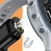 Close-up of a smartwatch charging cable connecting to a smartwatch. Produktbild-Vorschau