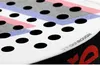 A close-up of a padel racket showing the surface texture and design. Produktbild-Vorschau