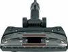 A close-up, front-facing view of a vacuum cleaner floor head attachment. Voir les images du produit