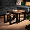 A living room setting with a couch and nesting coffee tables. Náhled obrázku produktu