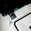 A close-up view of a white electrical enclosure with black sealing and silver screws. Produktbild-Vorschau