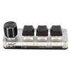 A close-up studio shot of a small, custom keyboard with a rotary encoder and three keys. Náhled obrázku produktu