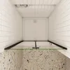 A top-down view of a shower enclosure with a white shower tray and glass panels. Produktbild-Vorschau