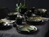 A table setting with a 30-piece stoneware dinnerware set in a Nordic Fjord Green color. Náhľad obrázku produktu