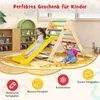 Two young children playing on a wooden climbing triangle with a slide indoors, with toys and shelves in the background. Produktbild-Vorschau