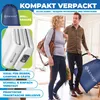 A couple walking out of a doorway with bags, implying travel or moving. Produktbild-Vorschau