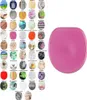 A collage of various toilet seat designs next to a single pink toilet seat. Náhled obrázku produktu