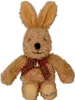 A plush toy rabbit sitting down. Produktbild-Vorschau