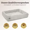 A dog bed with marketing text and badges. Produktbild-Vorschau