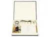 An open gift box containing a calligraphy set. Produktbild-Vorschau