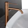A close-up shot of a copper-colored faucet over a white sink. Náhľad obrázku produktu