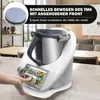 A kitchen appliance is shown on a countertop with a hand interacting with its screen. The background shows a blurred interior scene. Produktbild-Vorschau